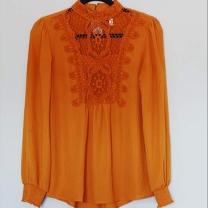 Burnt Orange/Yellow Tunic with Detailing.